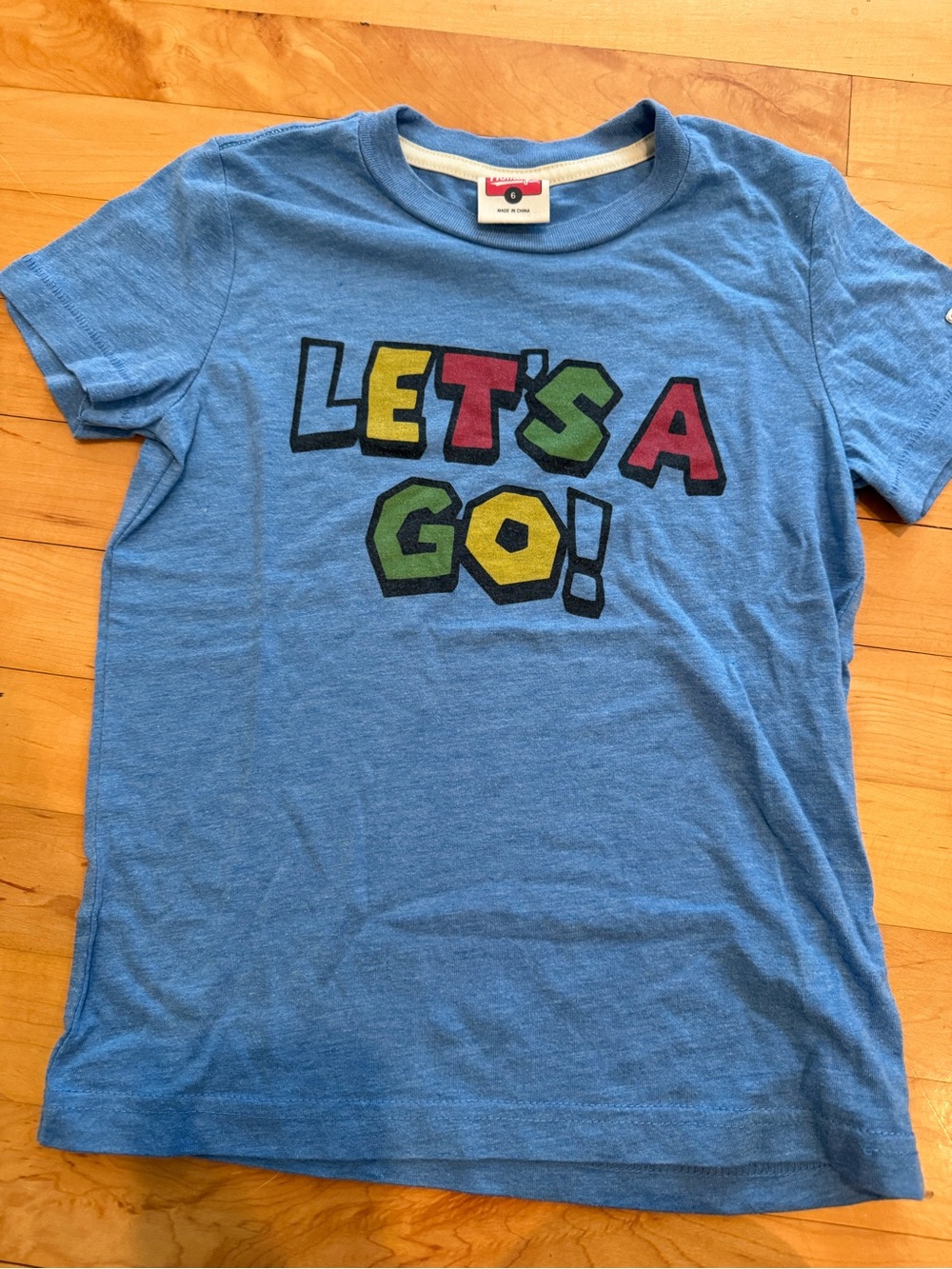 HOMAGE Light Blue 'LET'S A GO!' Kids Graphic Tee